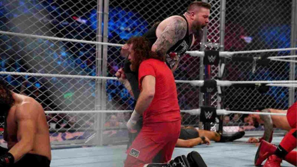 Sami Zayn delivers a low blow to Kevin Owens at the Survivor Series WarGames. (Image Credits- WWE)