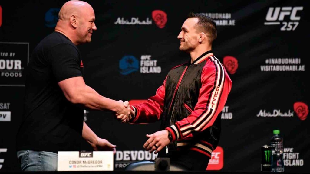 Michael Chandler (R) is greeted by Dana White (L) [Image Courtesy - Bloody Elbow]