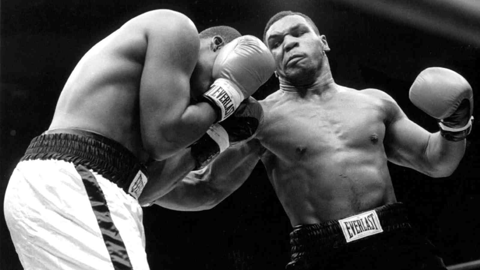 Mysterious man with smart phone in Mike Tyson’s 1995 fight spurts supernatural theories