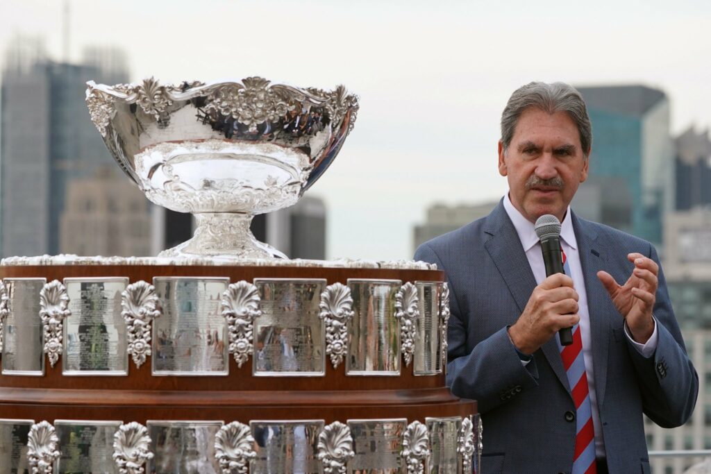 ITF President David Haggerty with Davis Cup trophy (Image Credit: The New York Times)