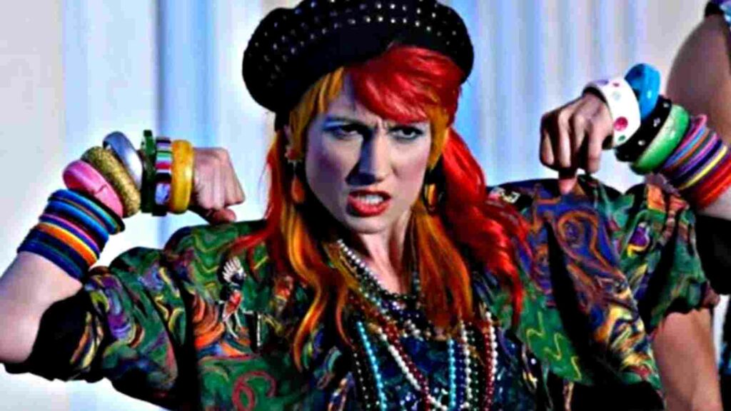 Becky Lynch as Cindy Lauper in Young Rock season 3 (Image Credits- WhatCulture)