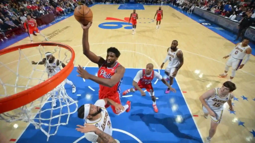 Joel Embiid attempts a layup