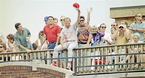 Tom Browning climbed on a rooftop full of drunk fans