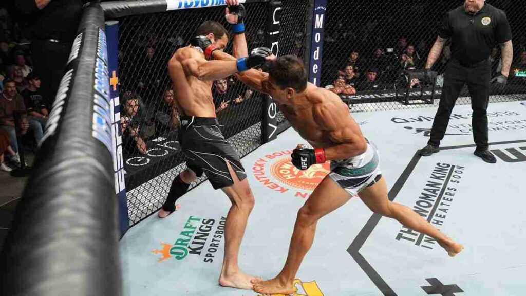 Paulo Costa (White Trunks) in action against Luke Rockhold [Image Source - MMA Fighting]