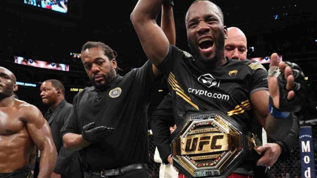 Leon Edwards (wearing the belt) enjoys his moment under the sun, after becoming the undisputed welterweight champion [Image Source - MMA Fighting]