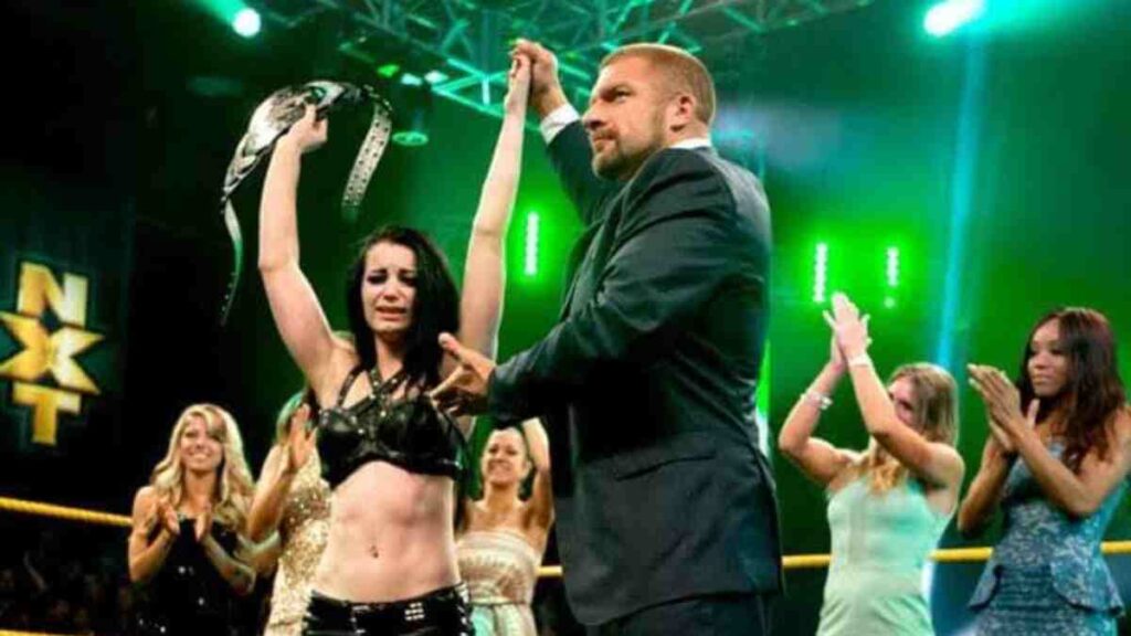 Triple H with Saraya, when she became a NXT Champion (Image Credits- Wrestling Headlines)